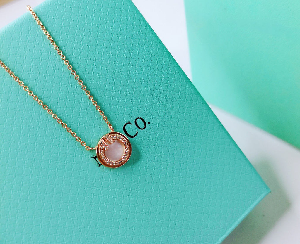TIFFANY DIAMOND AND MOTHER PEARL CIRCLE NECKLACE PENDANT