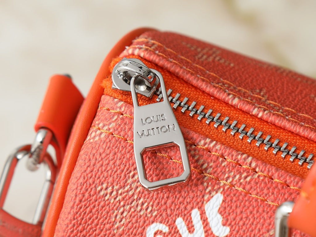 Louis Vuitton Keepall Orange Monogram Barrel Bag — detail