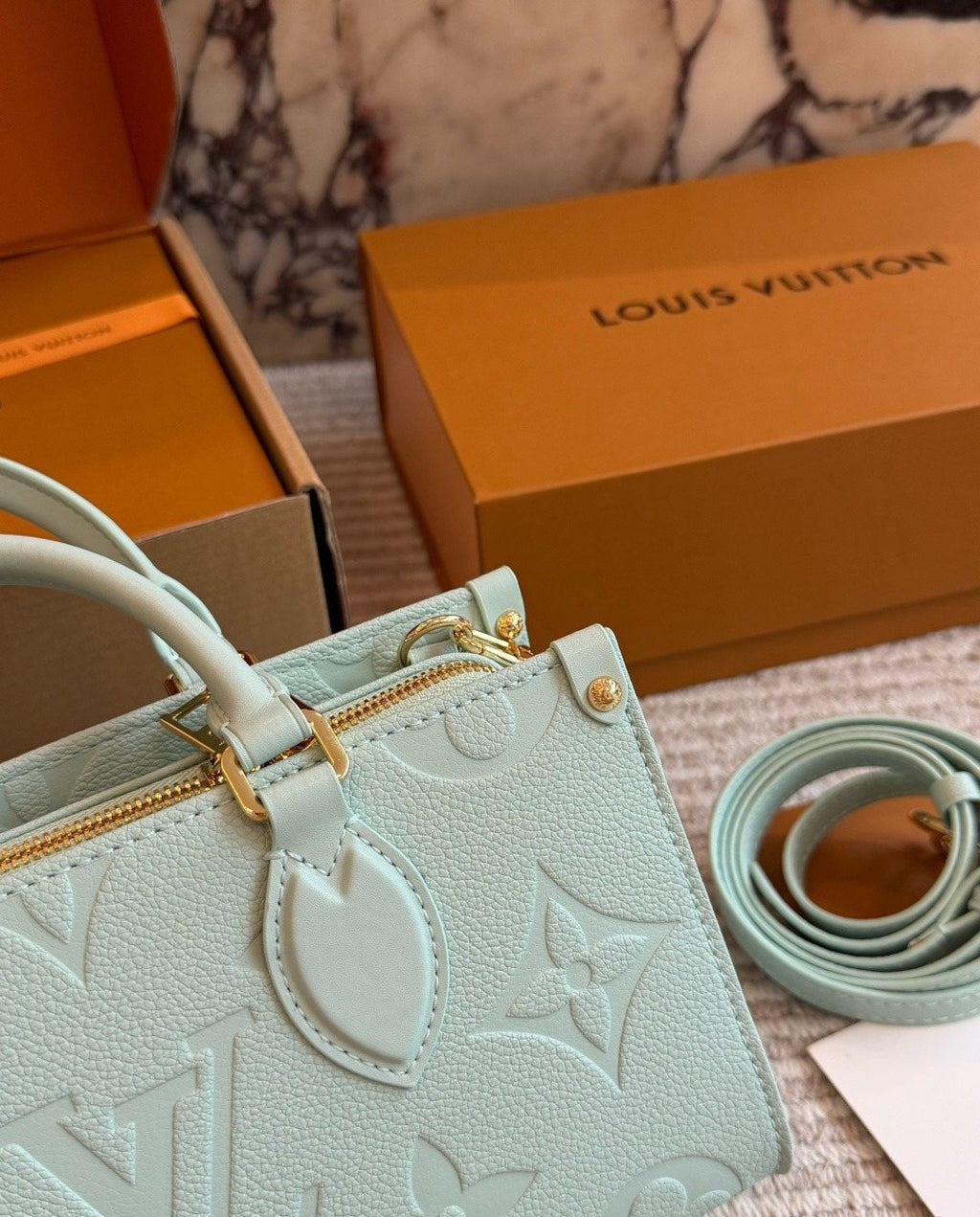 Louis Vuitton Onthego Mint Green Embossed Handbag — detail