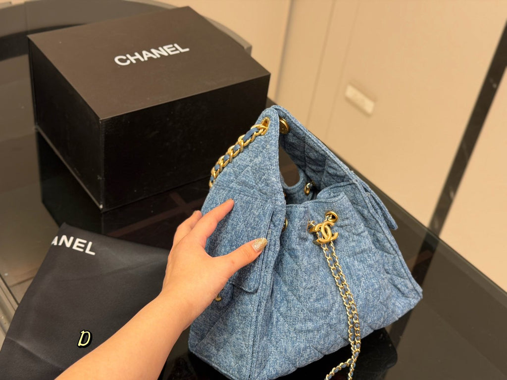 Chanel 25 Blue Quilted Hobo Bag — side