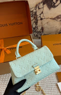 Louis Vuitton Nano Madeleine Monogram Empreinte Top-Handle Bag — hero
