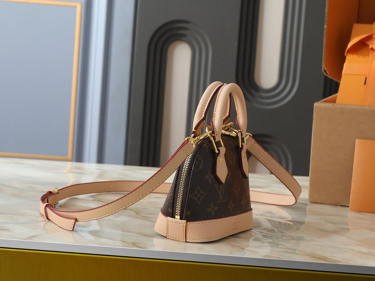 Louis Vuitton Nano Alma Monogram Top-Handle Bag — side