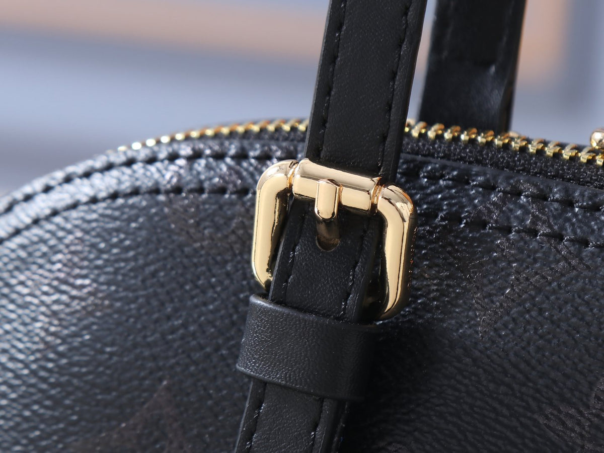 Louis Vuitton Squire East West Monogram Handbag — detail