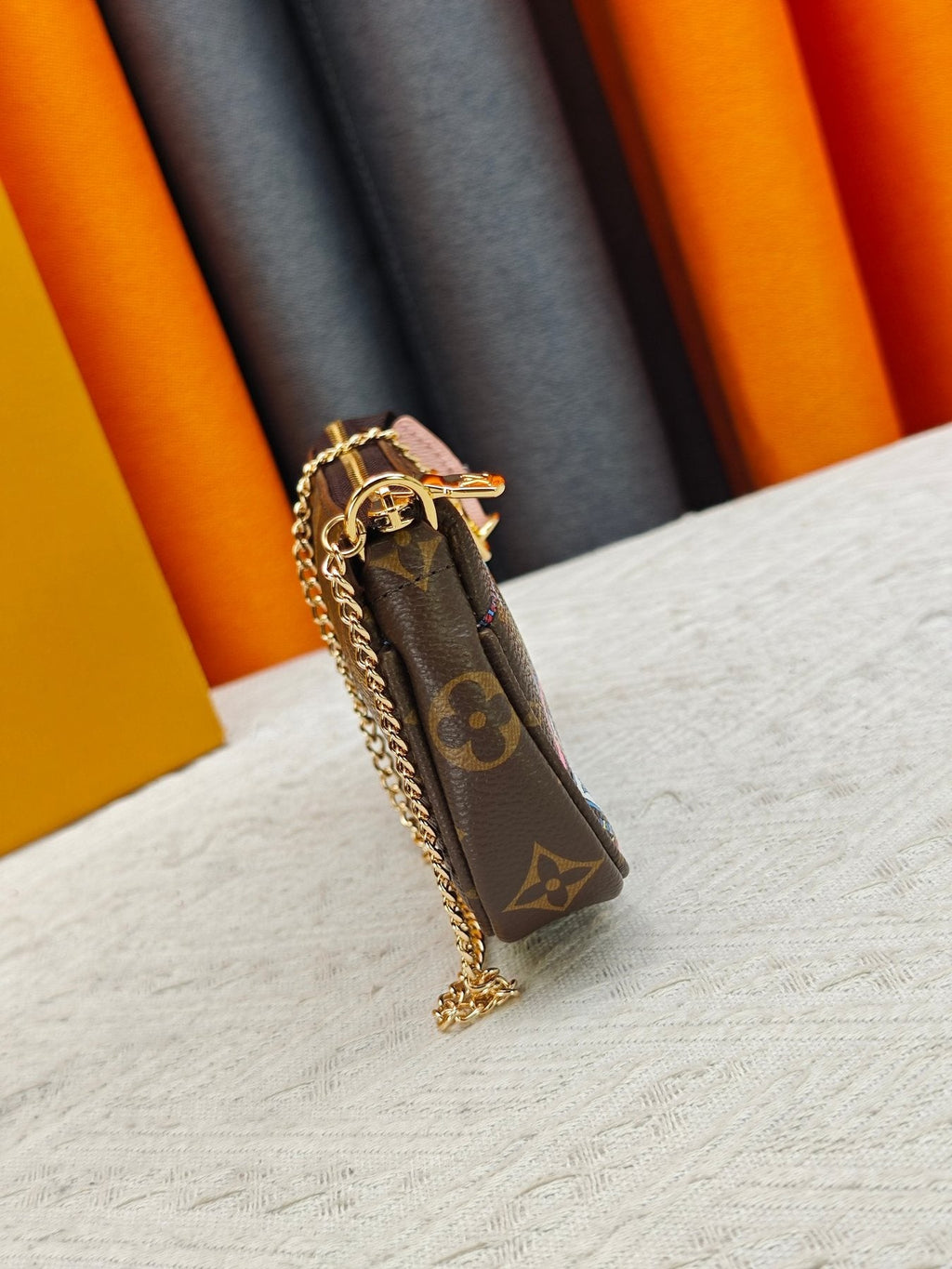 Louis Vuitton Illustrated Monogram Chain Pouch — side