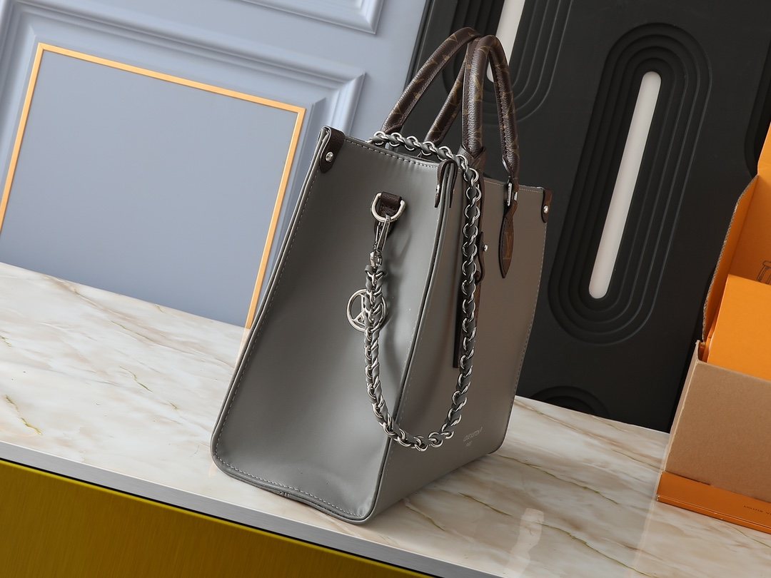 Louis Vuitton OnTheGo Gray Tote with Monogram Handles — side