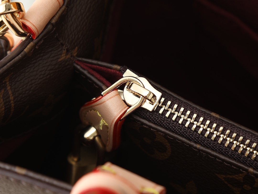 Louis Vuitton Montaigne Monogram Top-Handle Bag — detail