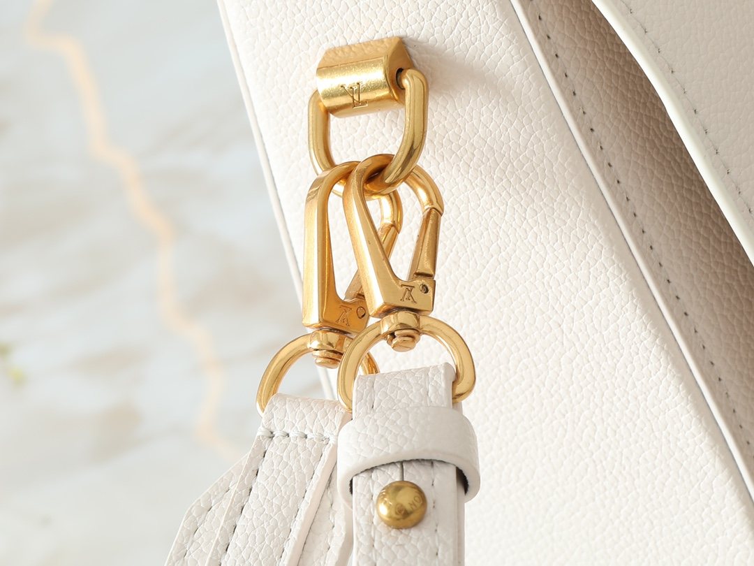 Louis Vuitton Soft Twist White Leather Shoulder Bag — detail