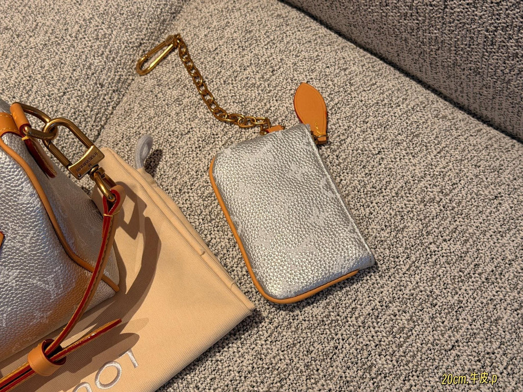 Louis Vuitton Speedy Rolled-Handle Satchel — detail