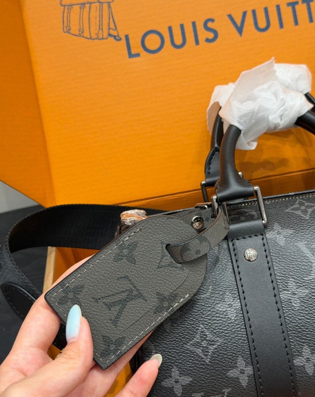 Louis Vuitton Keepall Black Monogram Duffel Bag — detail