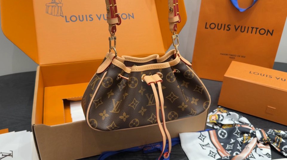 Louis Vuitton Nano Frivole Monogram Drawstring Shoulder Bag — hero
