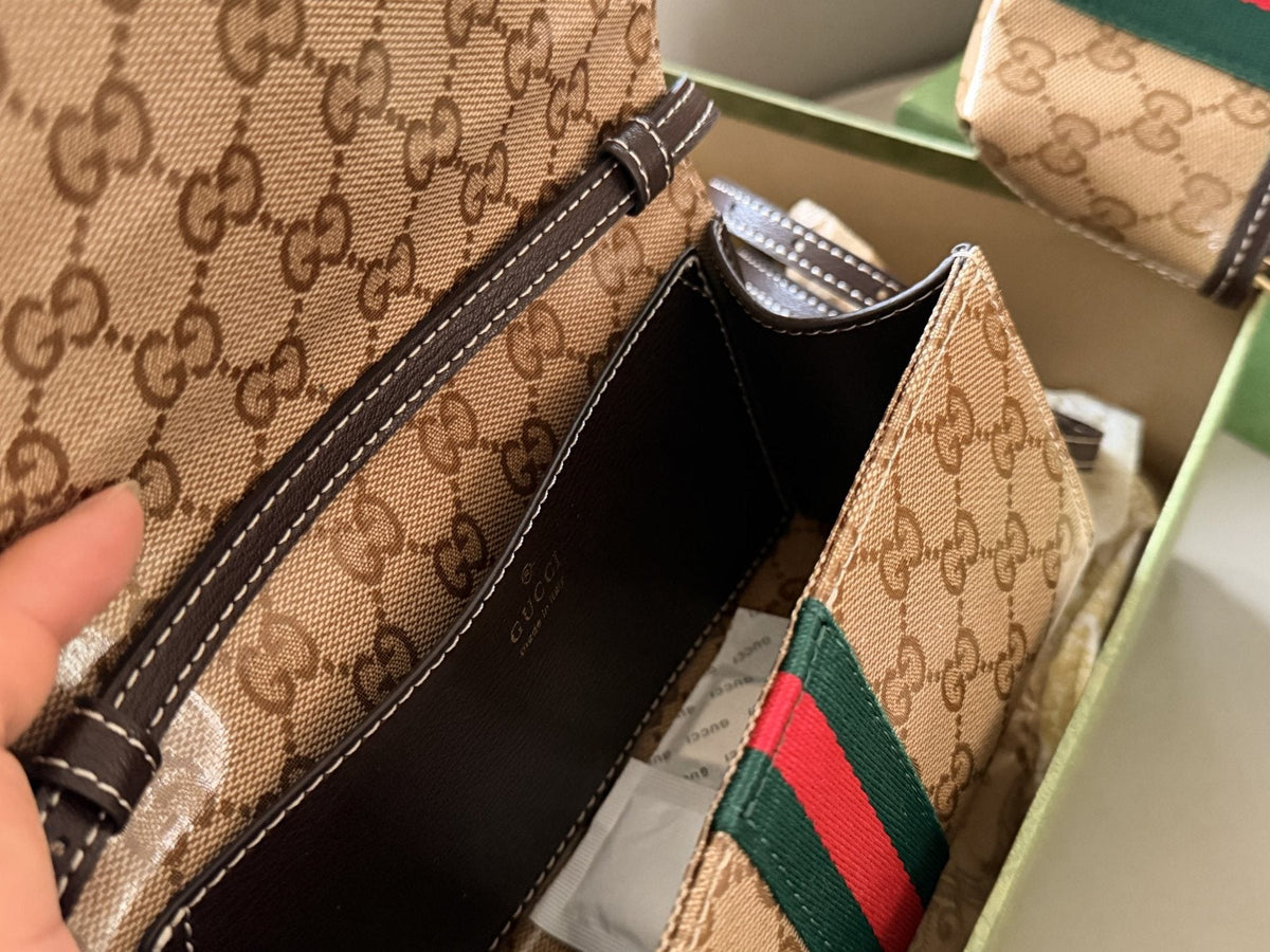 GG-Patterned Baguette Shoulder Bag with Striped Band — front