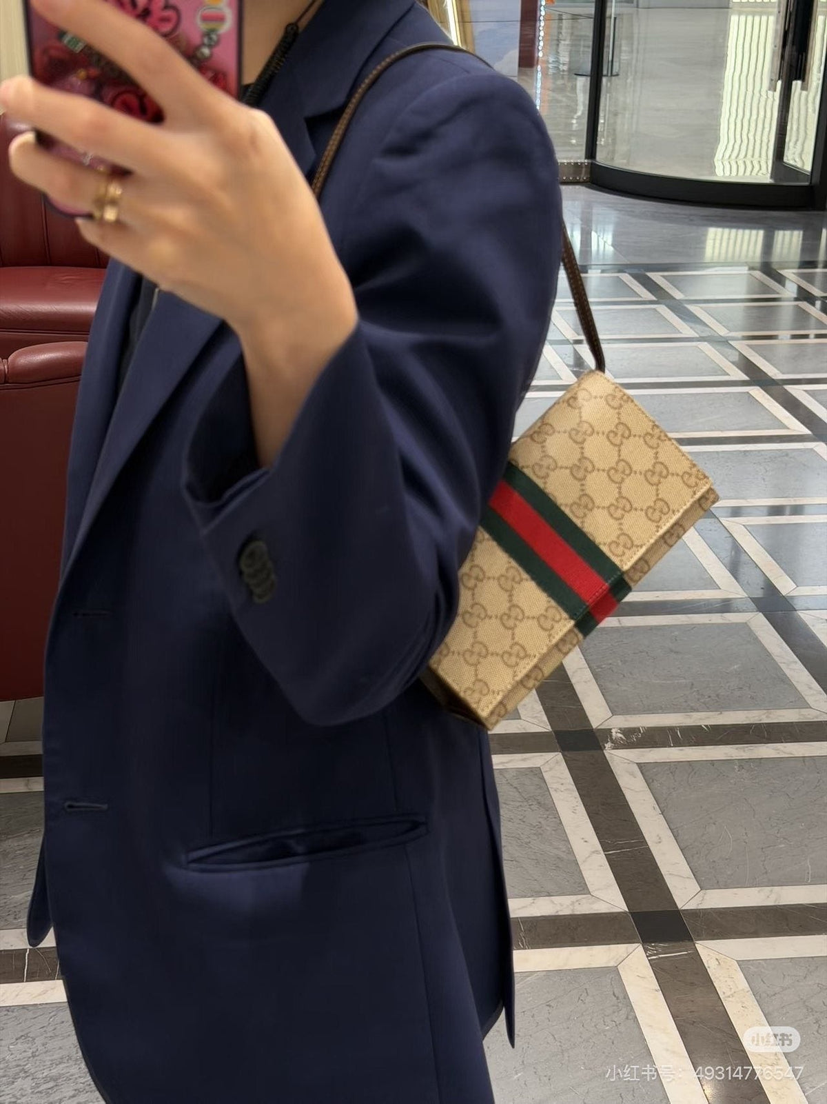 GG-Patterned Baguette Shoulder Bag with Striped Band — model