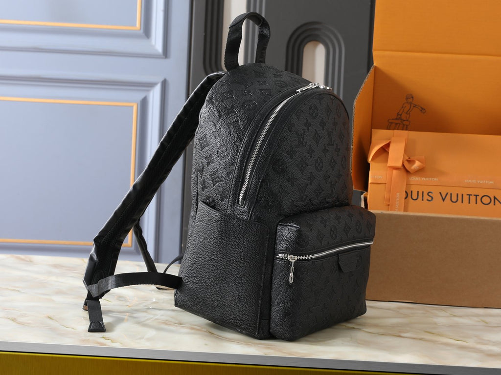 Louis Vuitton Discovery Domed Backpack — side