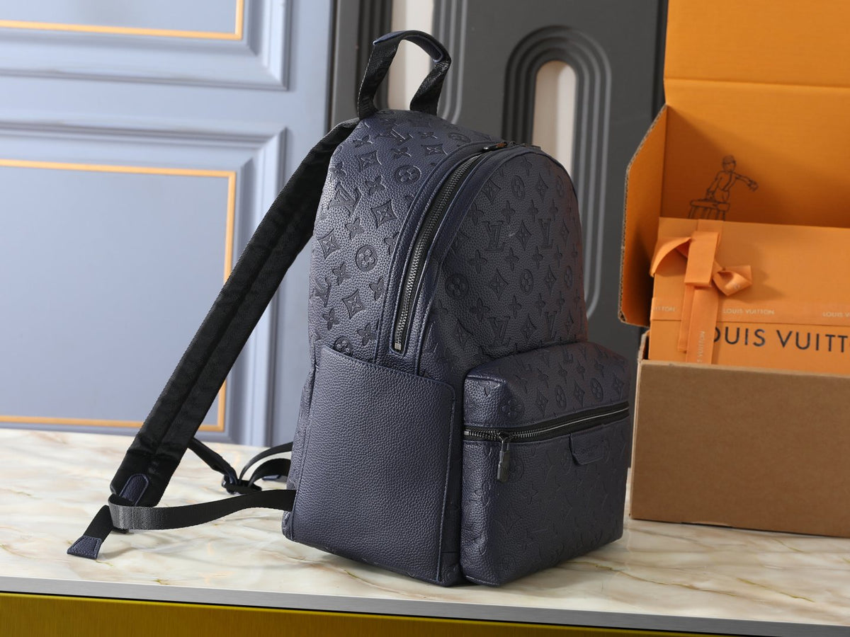 Louis Vuitton Discovery Domed Backpack — side