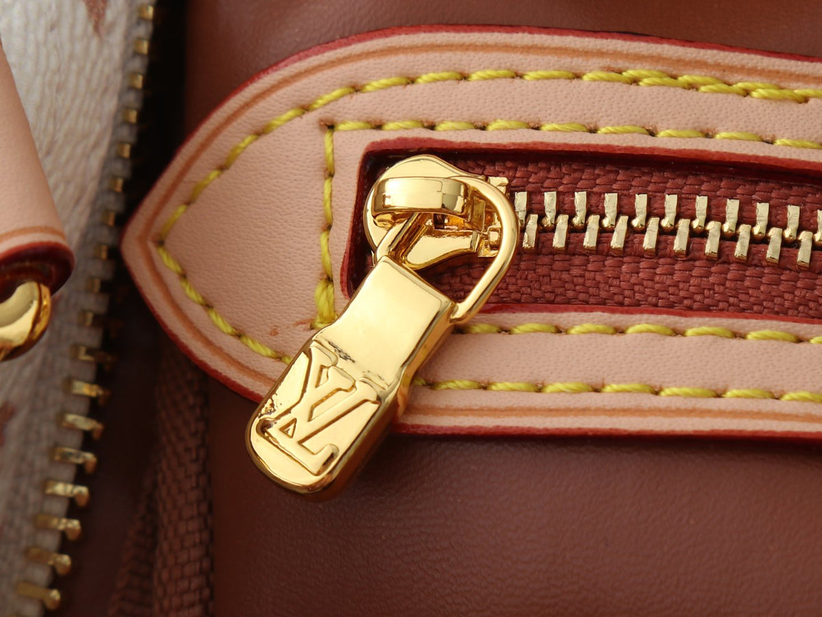 Louis Vuitton Crafty Speedy Bandoulière Monogram Bag — detail