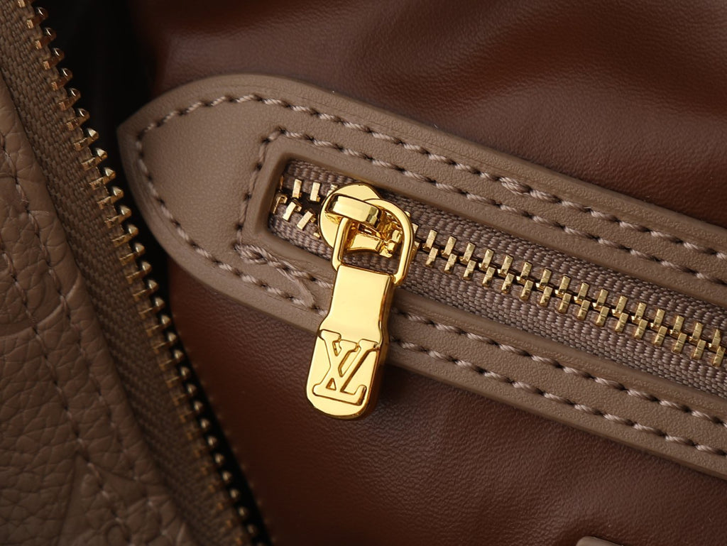 Louis Vuitton Speedy Bandoulière Embossed Monogram Bag — detail