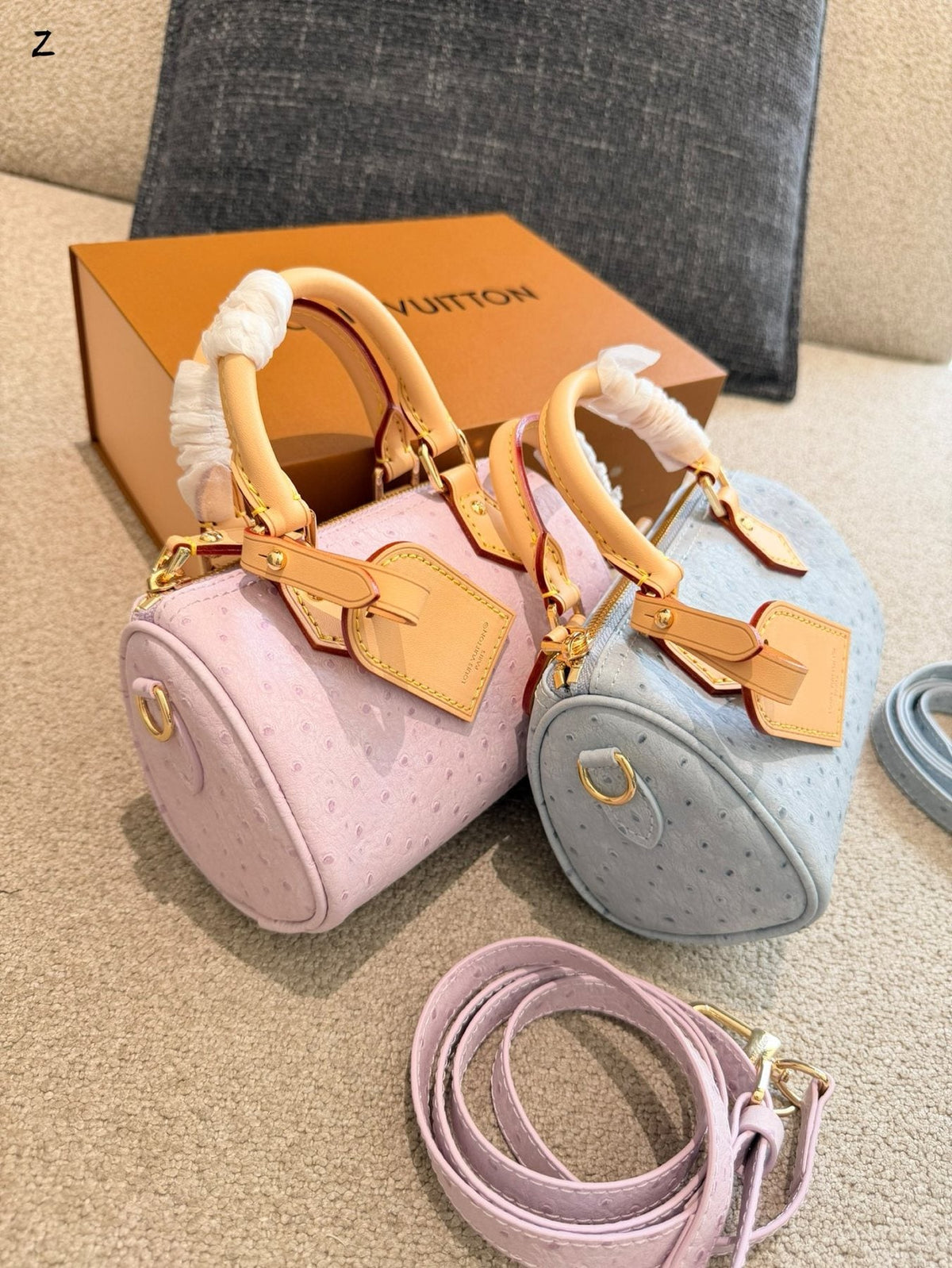 Louis Vuitton Speedy Embossed Monogram Top-Handle Bag — comparison