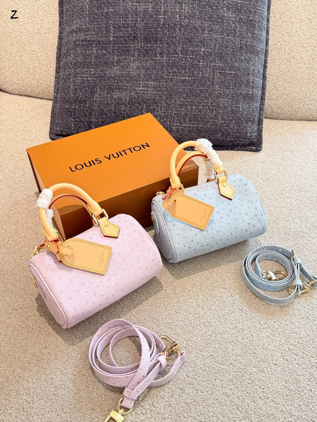 Louis Vuitton Speedy Embossed Monogram Top-Handle Bag — comparison