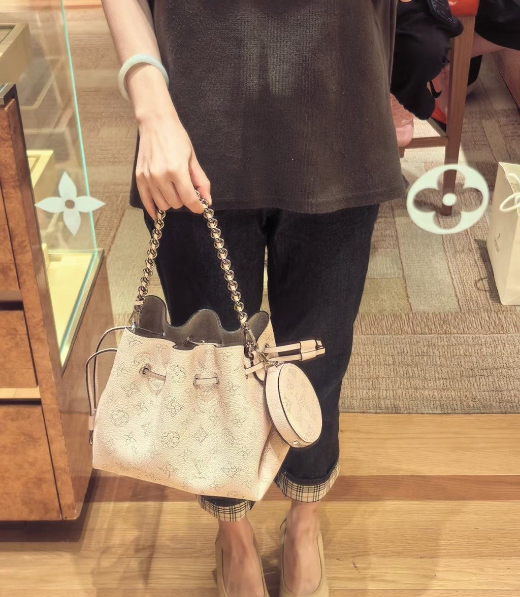 Louis Vuitton Bella Perforated Monogram Bucket Bag — model