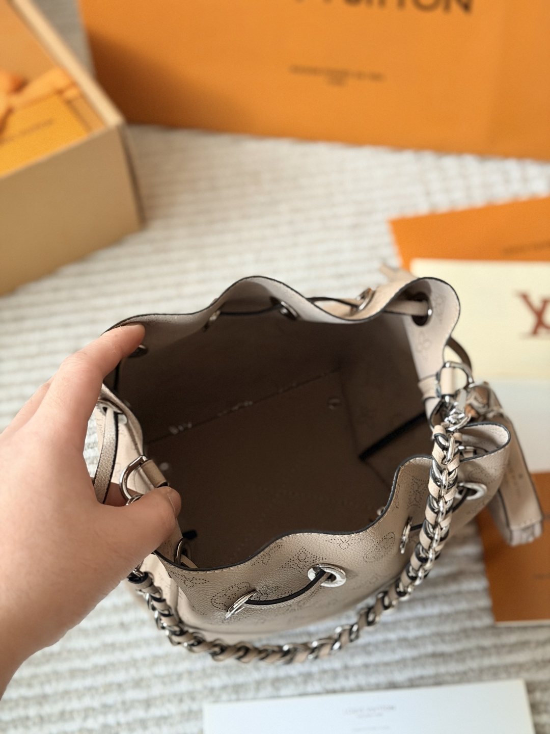 Louis Vuitton Bella Perforated Monogram Bucket Bag — front