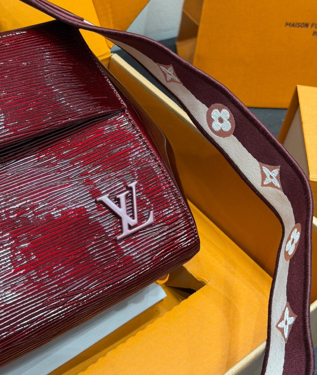 Louis Vuitton Cluny BB Glossy Textured Top-Handle Bag — detail