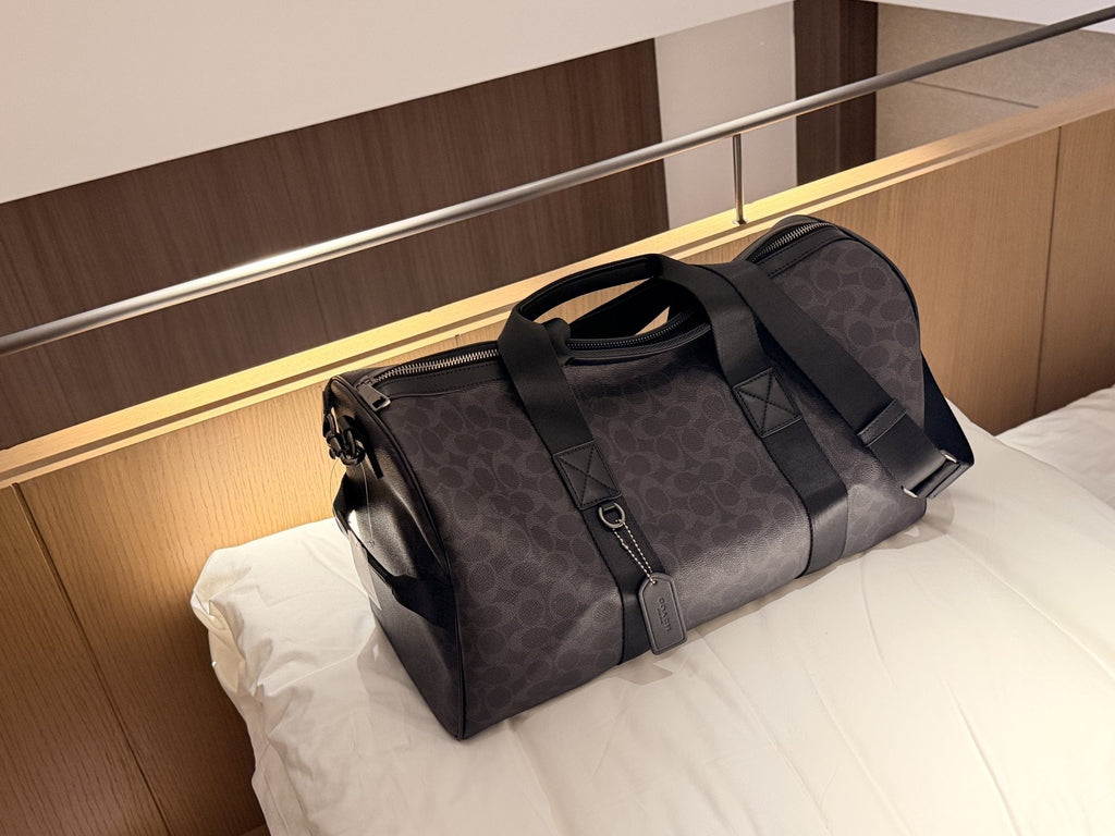 Dark Brown Patterned Duffel Bag with Black Trim — hero