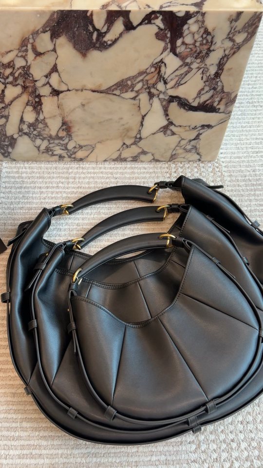 Saint Laurent Mombasa Pleated Crescent Shoulder Bag — comparison