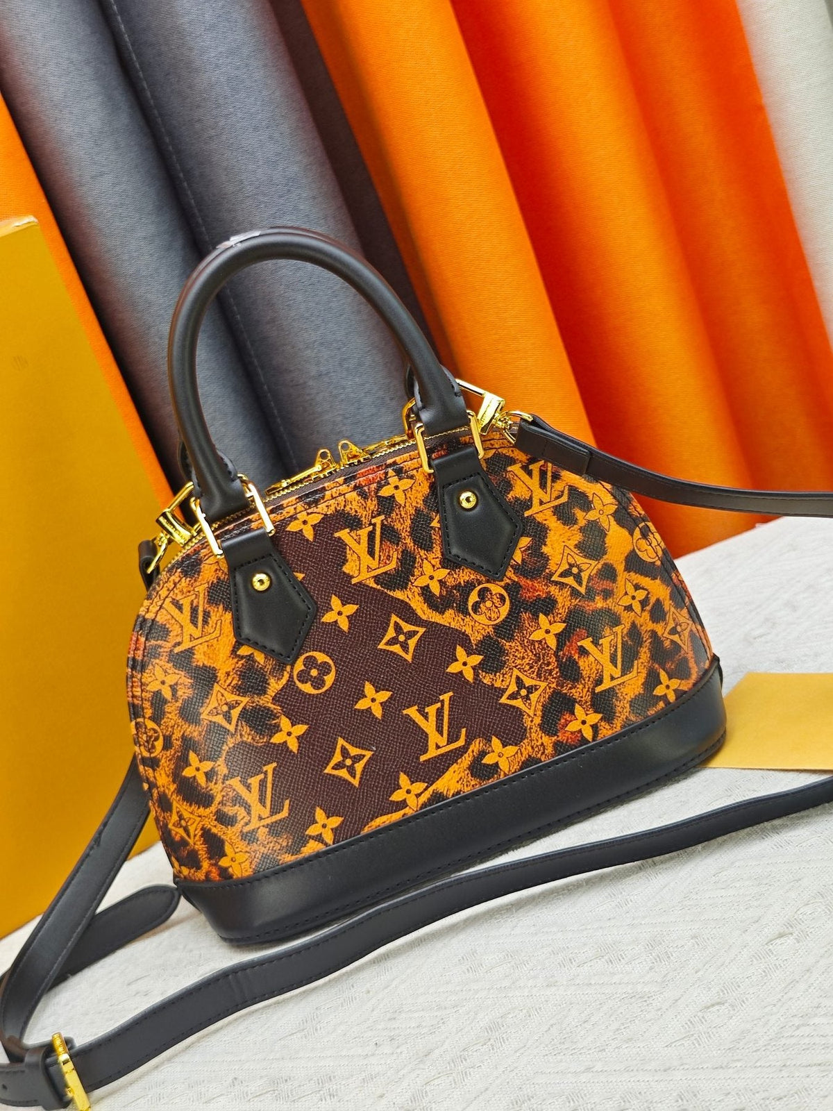Louis Vuitton Alma BB Domed Top-Handle Bag — back