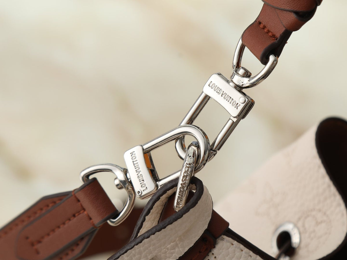 Louis Vuitton Muria Braided-Handle Bucket Bag — detail