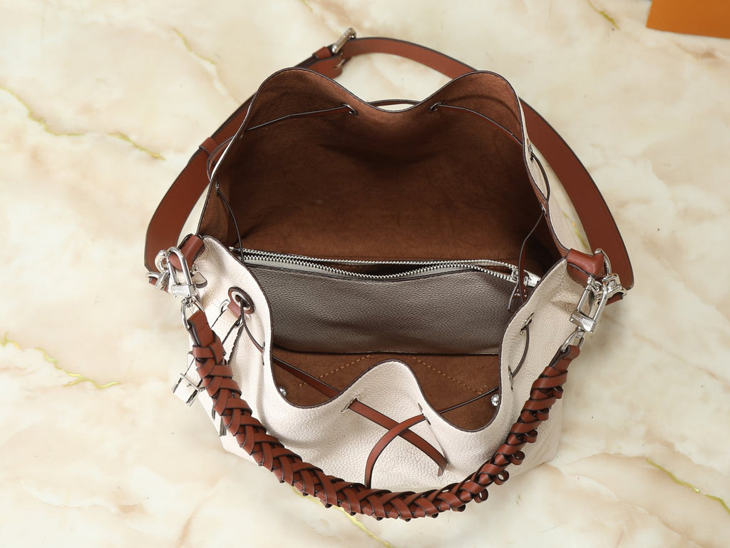 Louis Vuitton Muria Braided-Handle Bucket Bag — detail