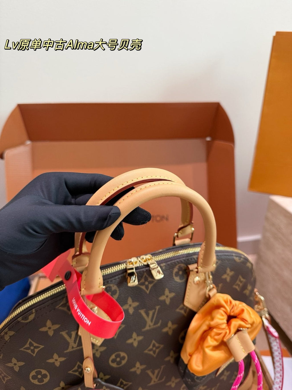 Louis Vuitton Alma Monogram Handbag with Pink Strap — detail