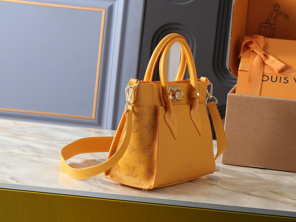 Louis Vuitton On My Side Turnlock Tote — side