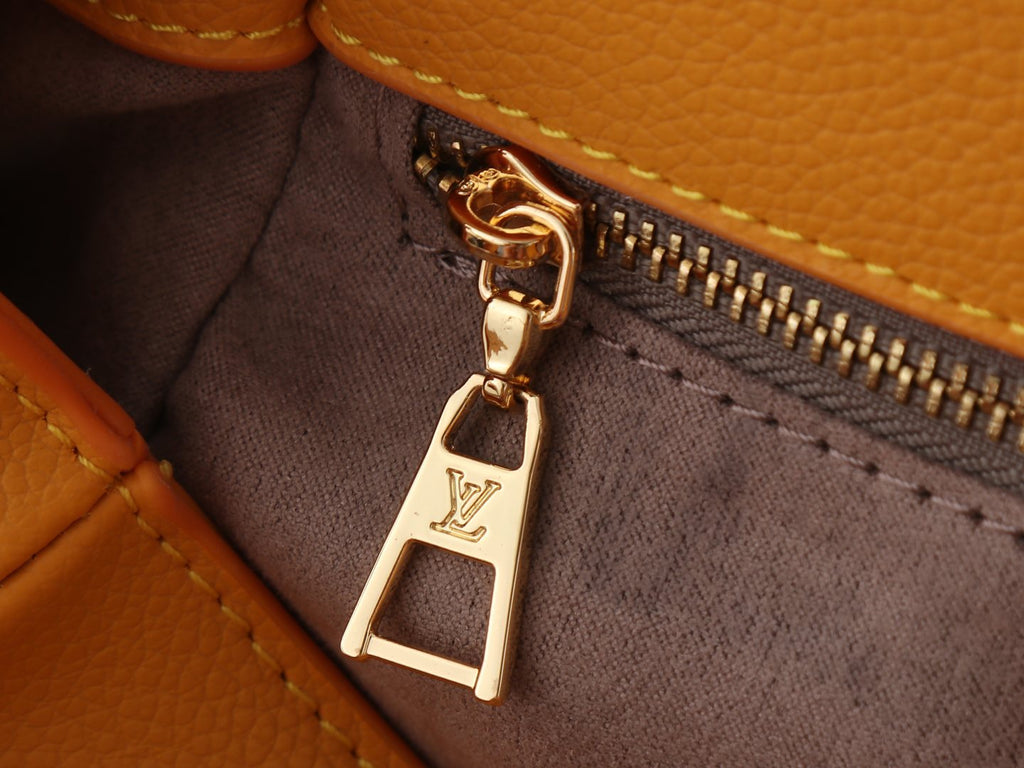 Louis Vuitton On My Side Turnlock Tote — detail