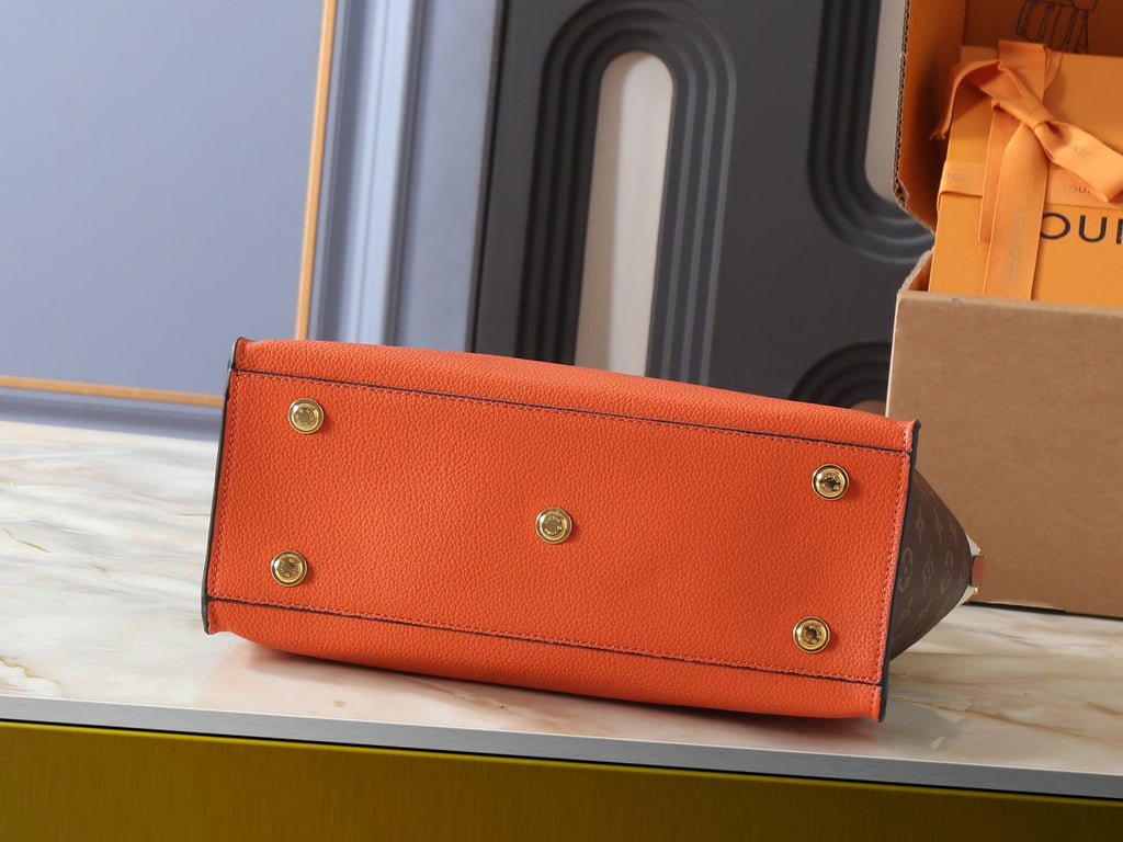 Louis Vuitton On My Side Turnlock Tote — detail