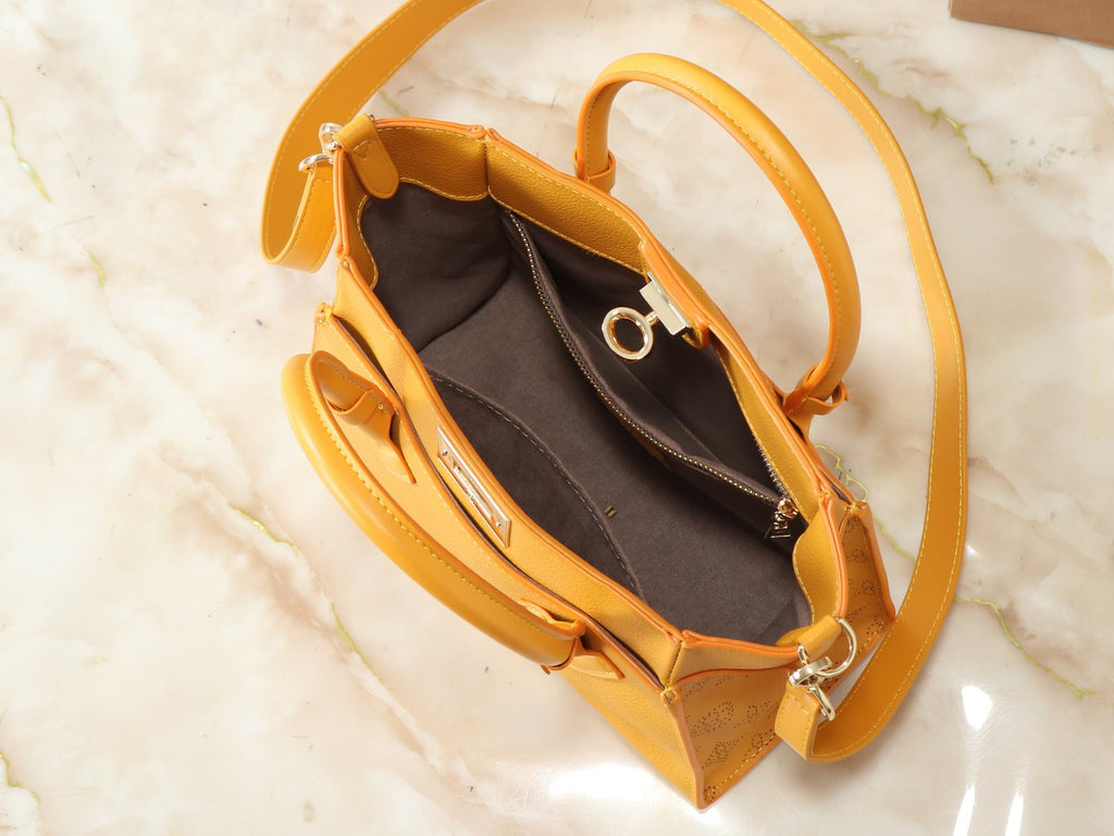 Louis Vuitton On My Side Turnlock Tote — detail