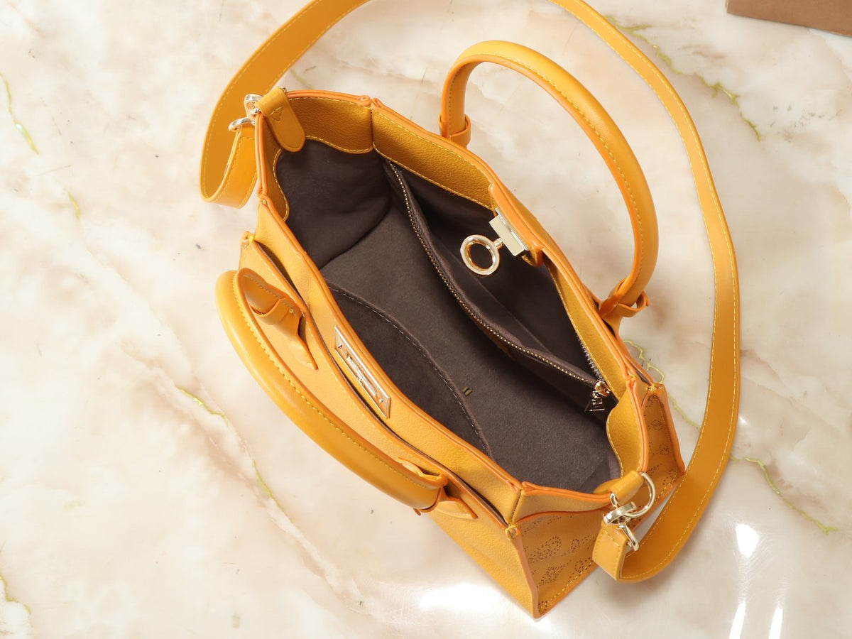 Louis Vuitton On My Side Turnlock Tote — detail