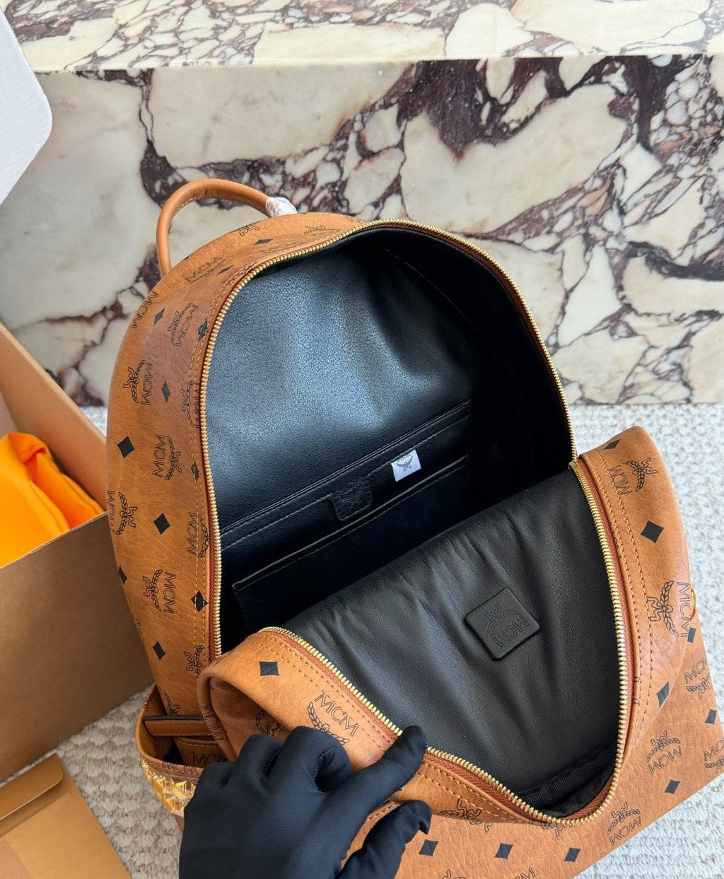 MCM Studded Monogram Backpack — detail