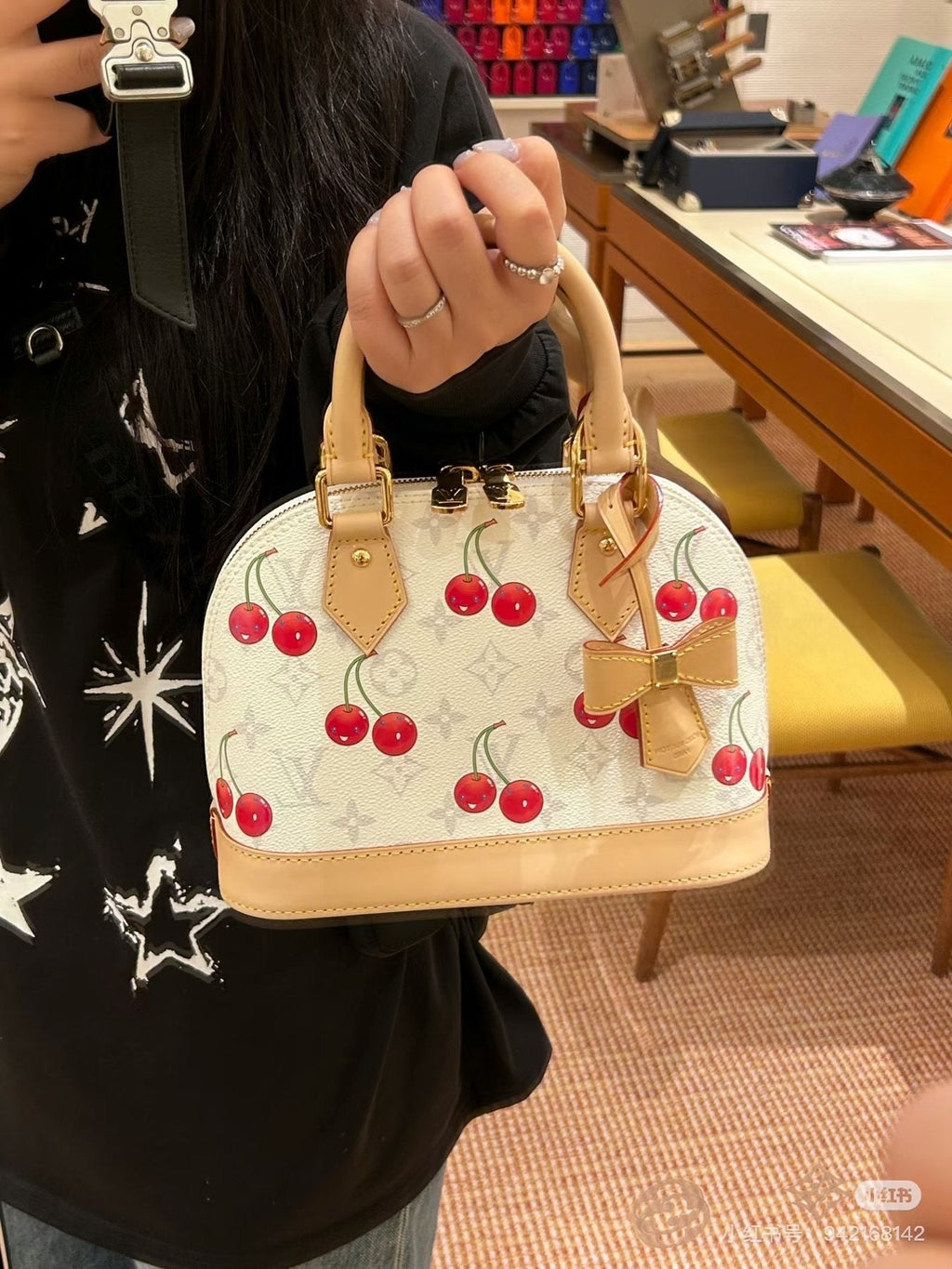 Louis Vuitton Alma BB Cherry Print Handbag — model