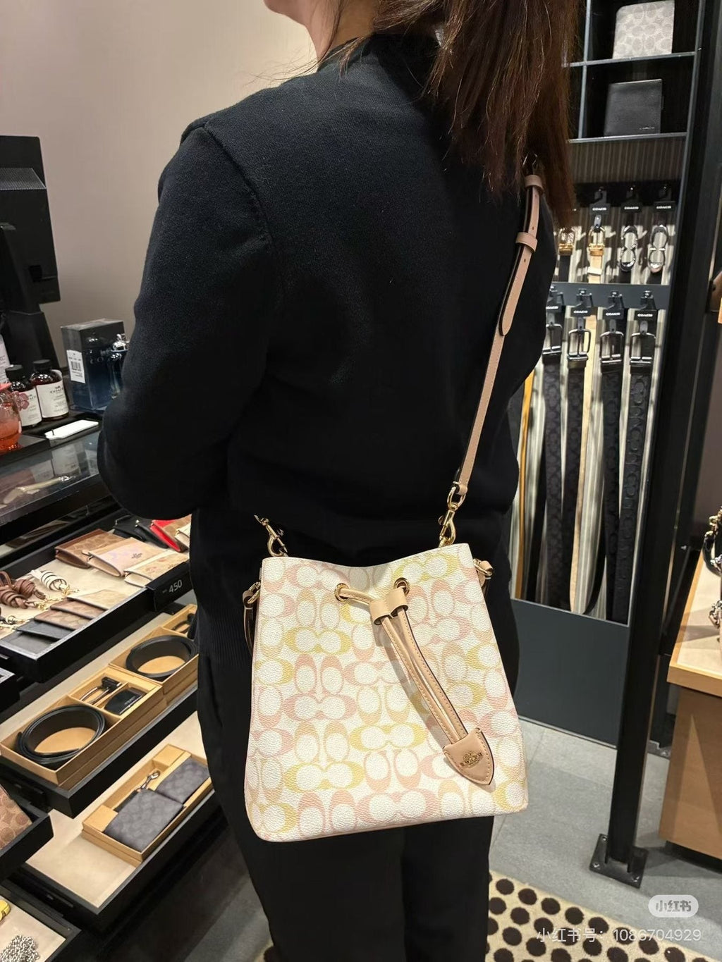 Coach Rowan Pastel Signature Drawstring Bucket Bag — model