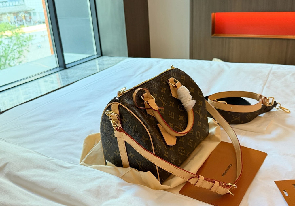 Louis Vuitton Speedy Monogram Satchel with Tan Trim — side