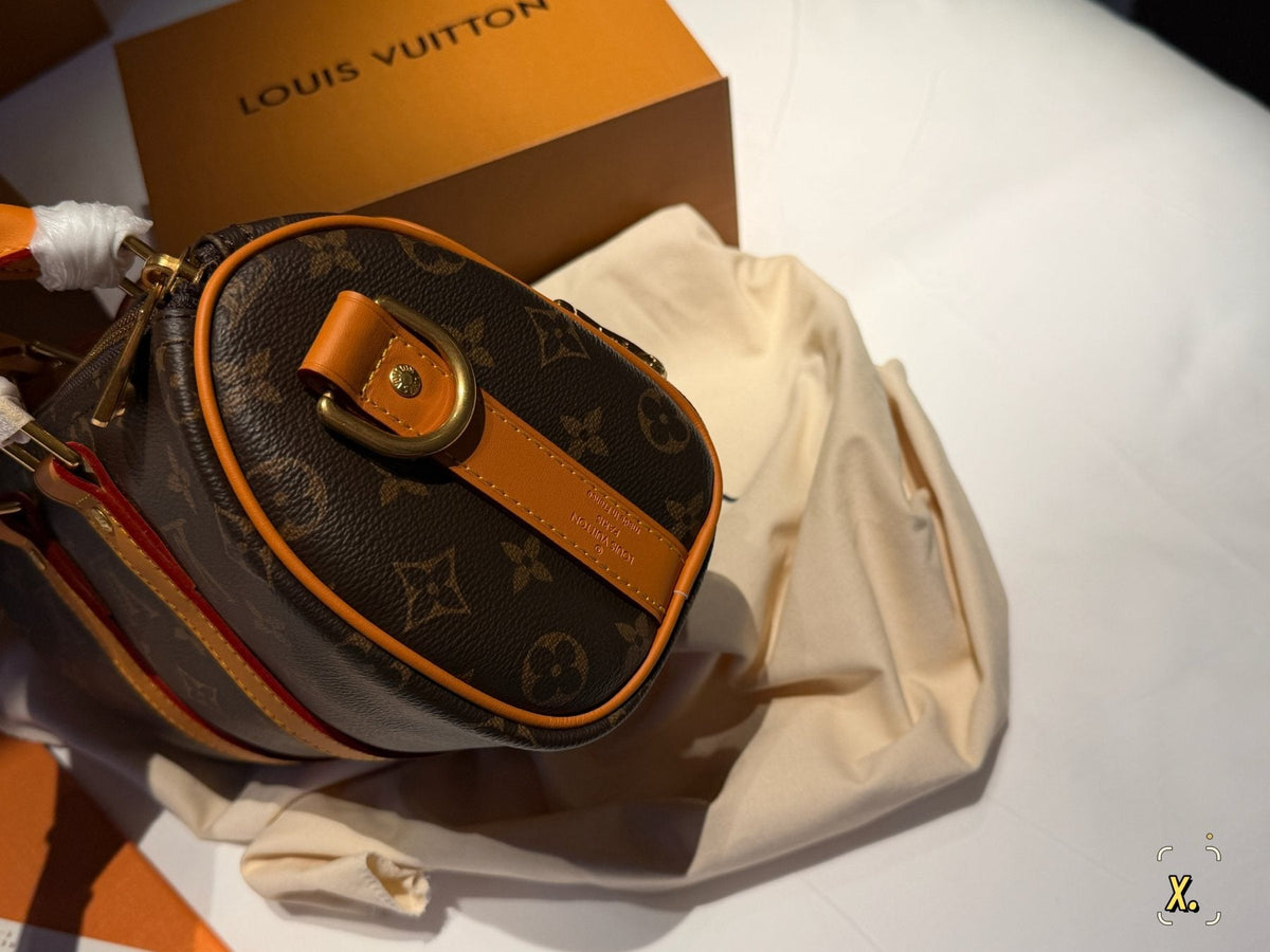 Louis Vuitton Keepall Front Pocket Barrel Bag — side