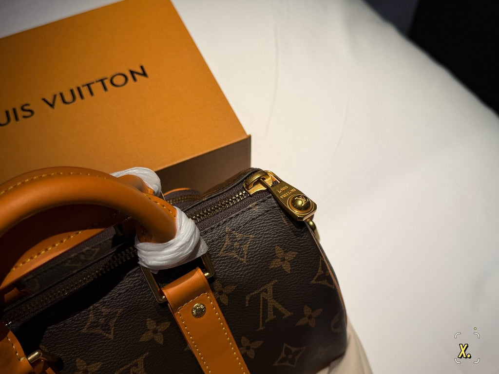 Louis Vuitton Keepall Front Pocket Barrel Bag — detail