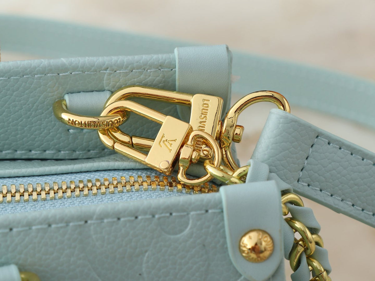 Louis Vuitton OnTheGo East West Monogram Empreinte Tote — detail