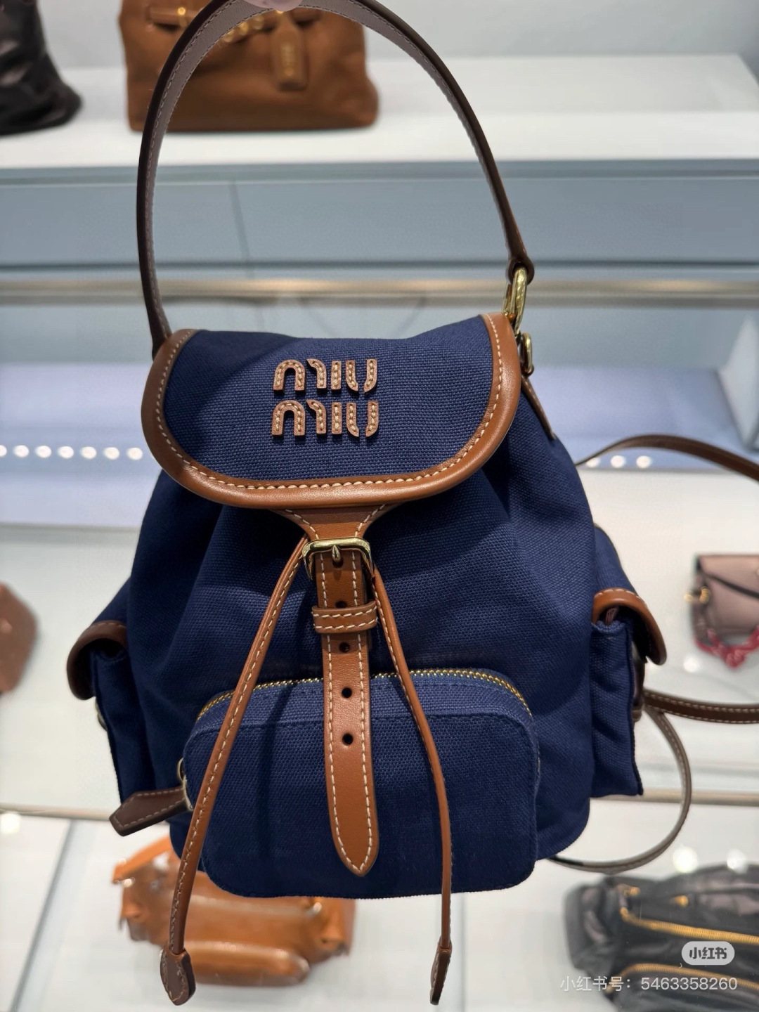 Miu Miu Canvas Flap Backpack — hero