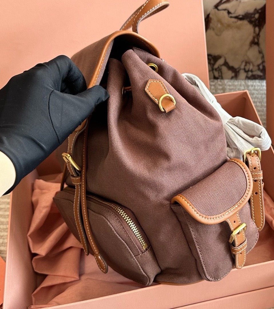 Miu Miu Canvas Flap Backpack — side