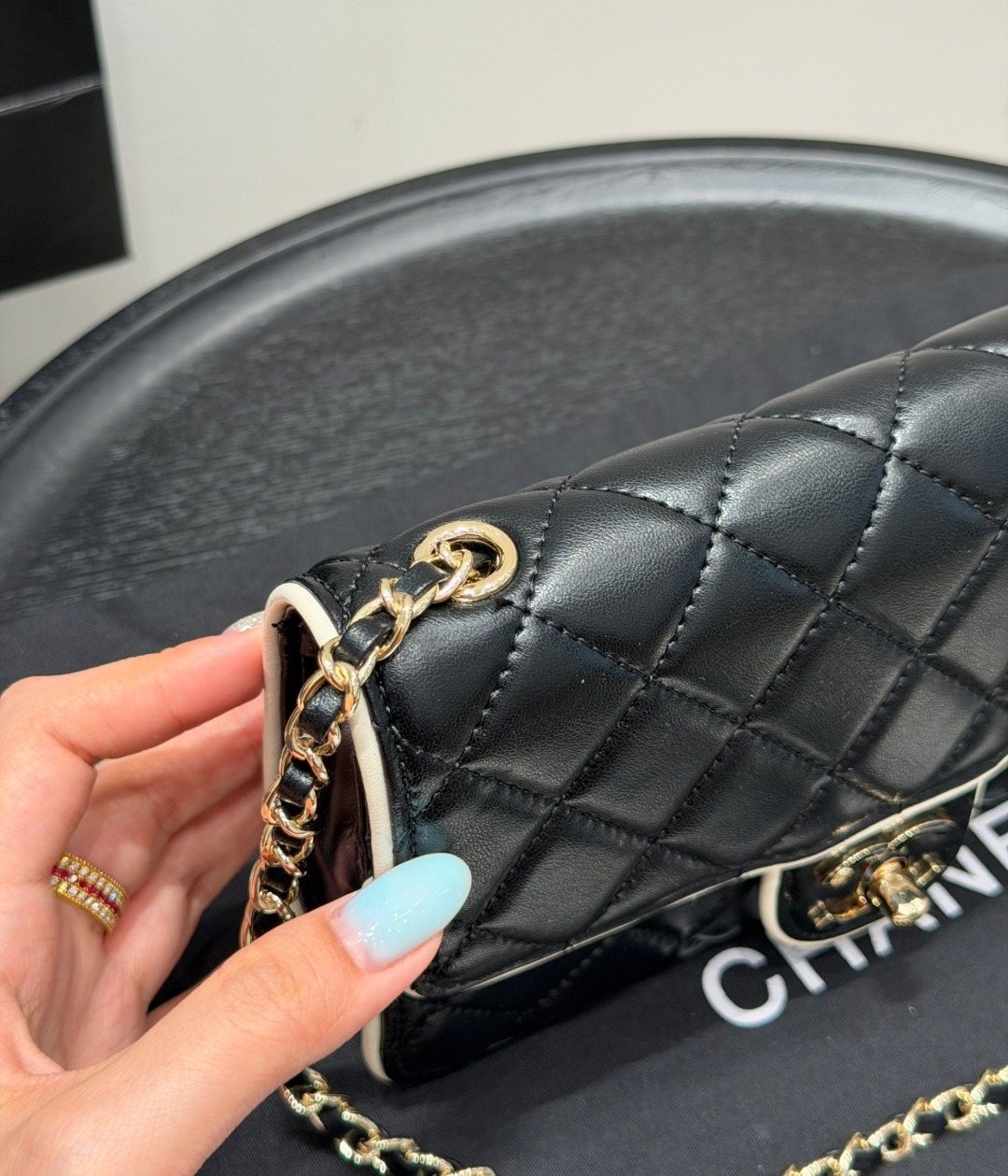 Chanel Quilted Wallet on Chain with Contrast Piping — detail