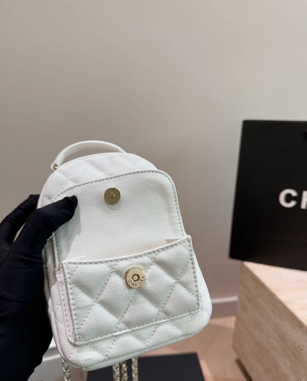 Chanel Quilted Top-Handle Backpack — front