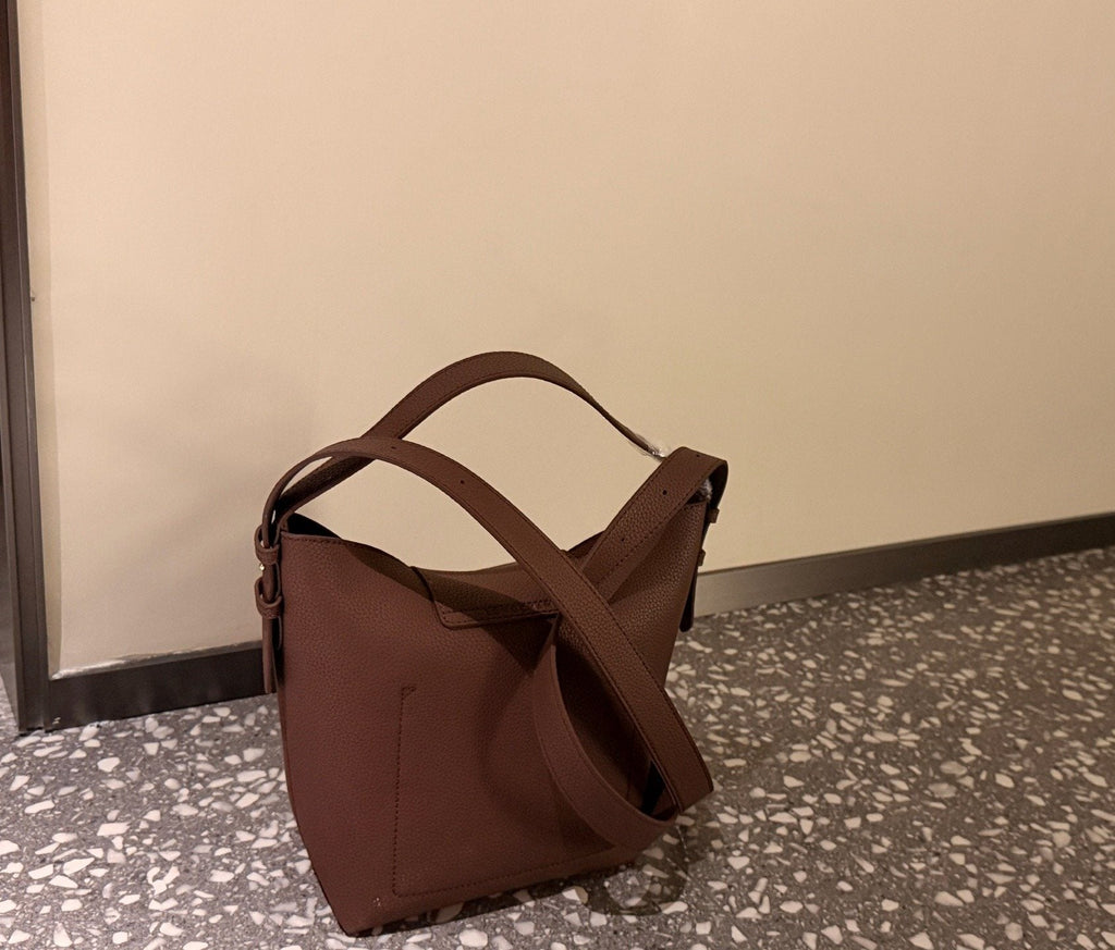 Longchamp Pebbled Leather Top-Handle Bucket Bag — hero