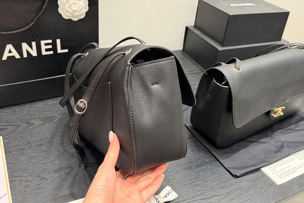 Chanel Maxi Flap Pebbled Shoulder Bag — side