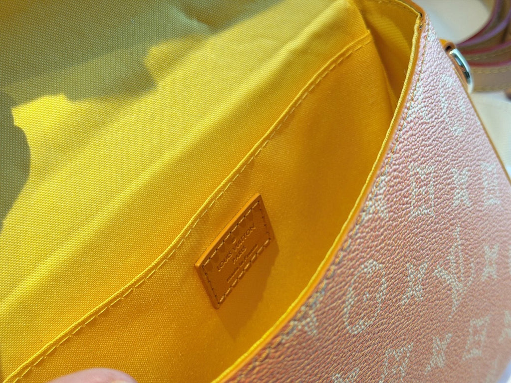 Louis Vuitton Curved-Flap Messenger Bag — detail